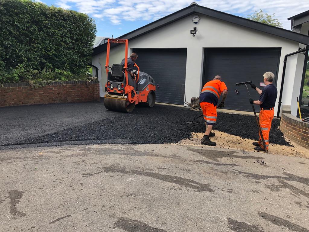 This is a photo of a bitumen driveway which is in the process of being installed by Sunshine Road Tech