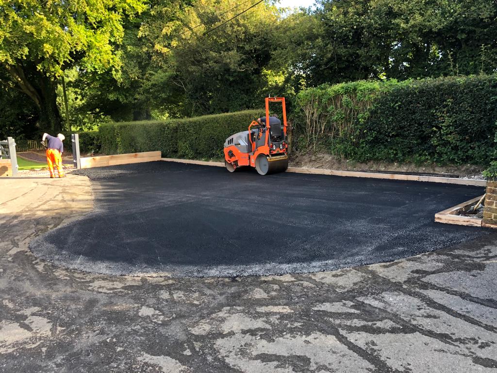 This is a photo of a bitumen driveway which is in the process of being installed by Sunshine Road Tech